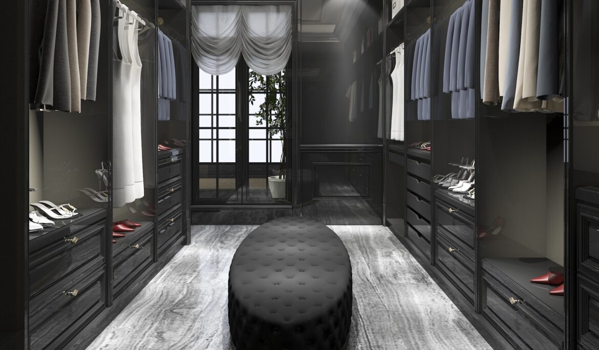 luxury walk closet Dubai design | Long narrow luxury walk-in wardrobe with floor-to-ceiling dark cabinets