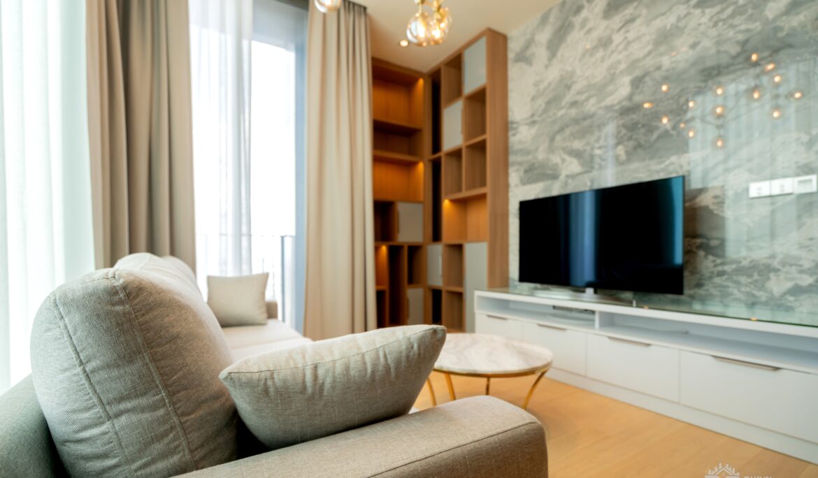 Dubai contemporary modern living room with grey marble TV wall and floating white media console — DubaiRenovate