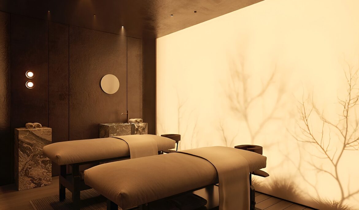 Minimalist Warm Massage Room Dubai | Low-lit minimalist massage room with two parallel tables